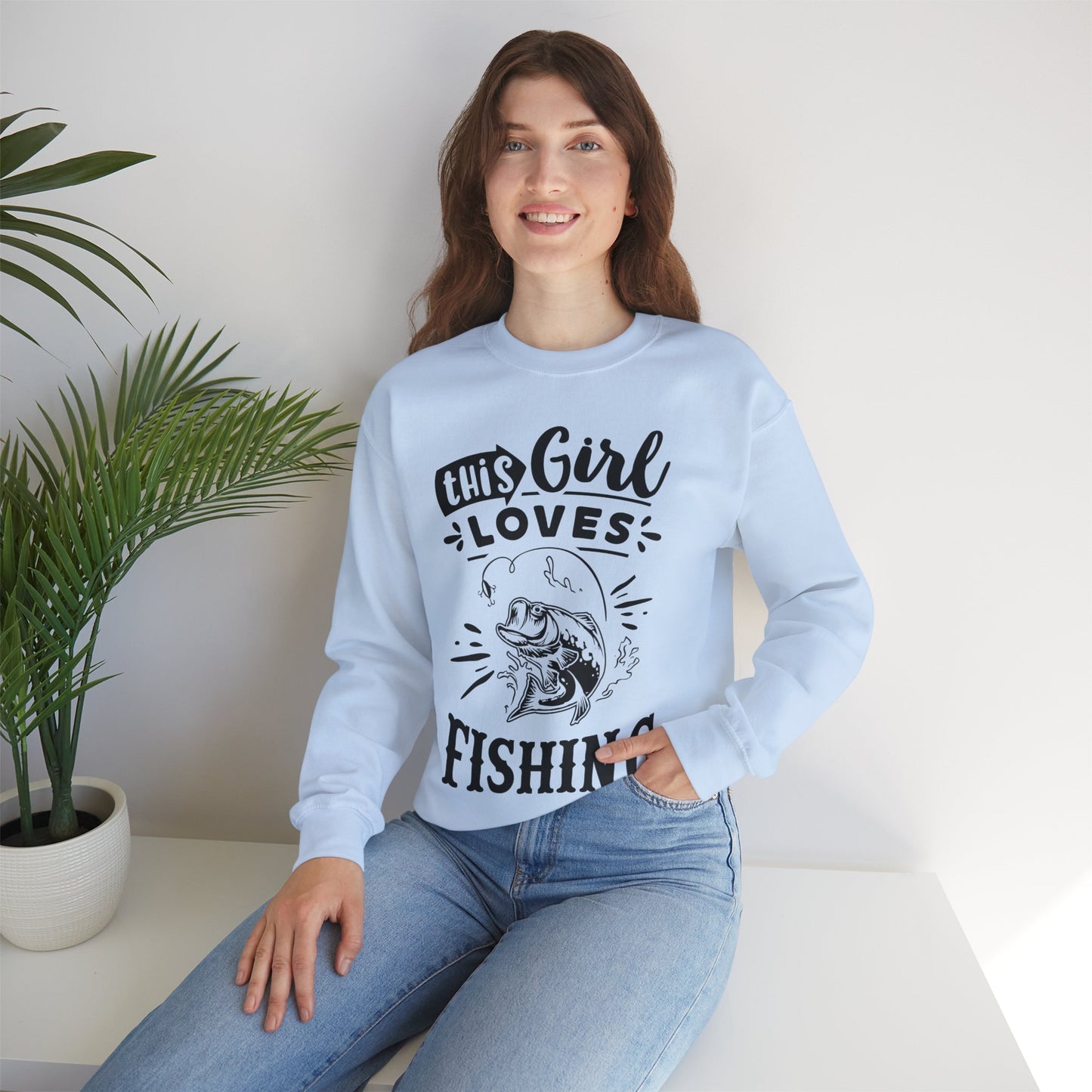 This girl loves fishing - Unisex Heavy Blend™ Crewneck Sweatshirt